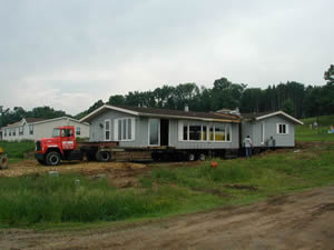 House was moved in seperate pieces and put back together at new site 